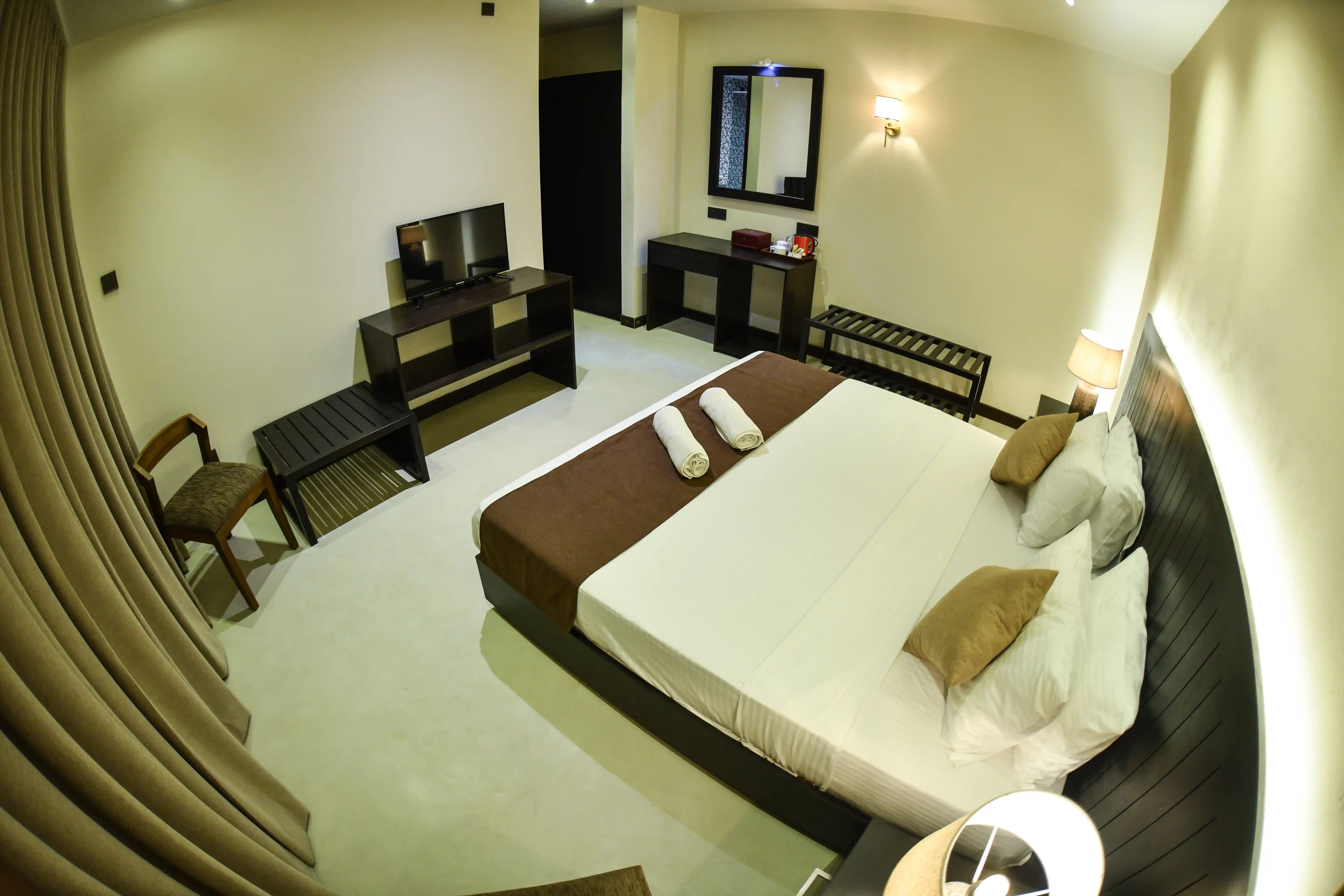Double room at Hiriketiya Beach Resort with modern amenities in Hiriketiya