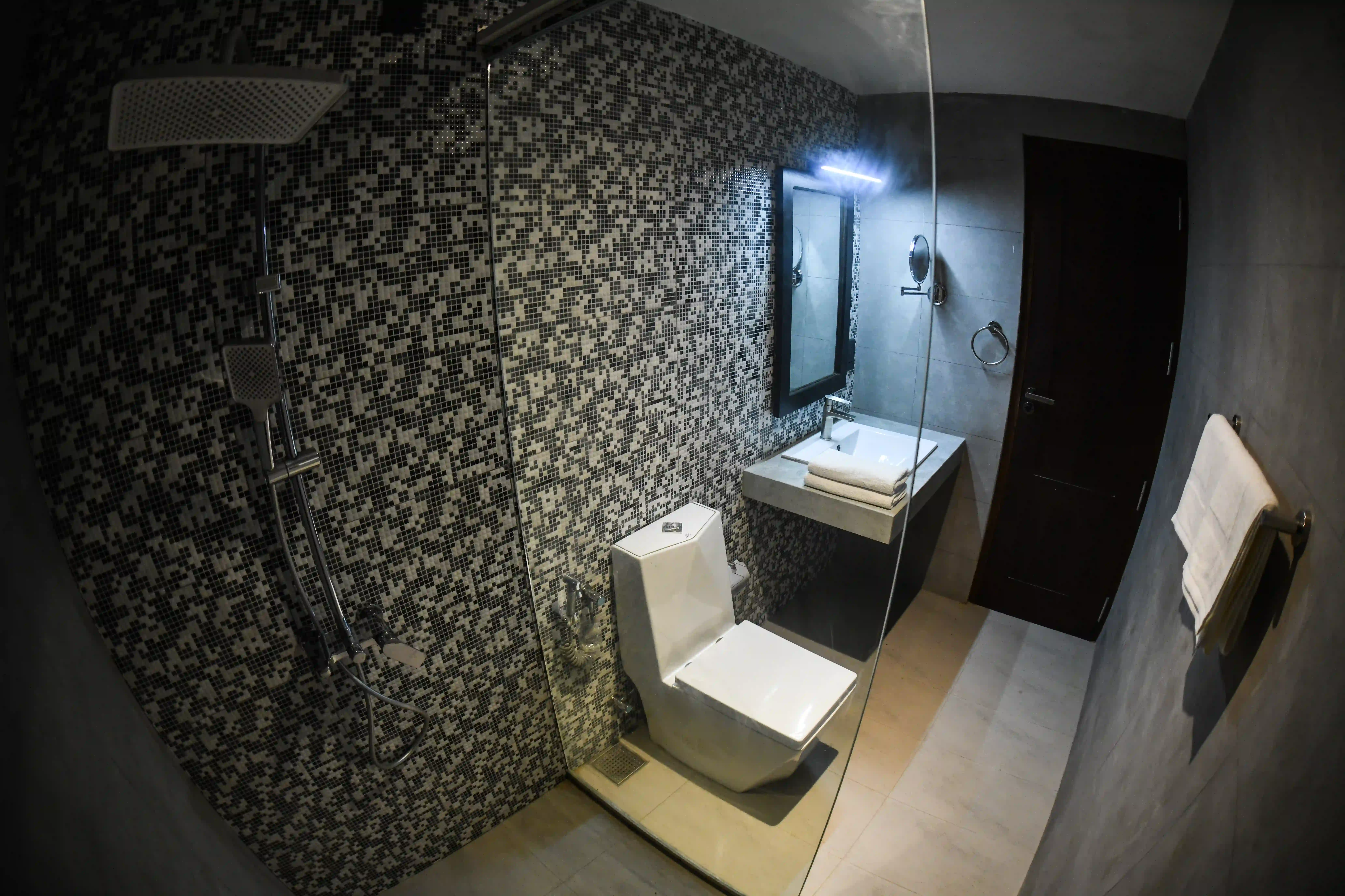 Modern bathroom with vanity sink and shower at Hiriketiya Beach Resort for comfortable Hiriketiya accommodation