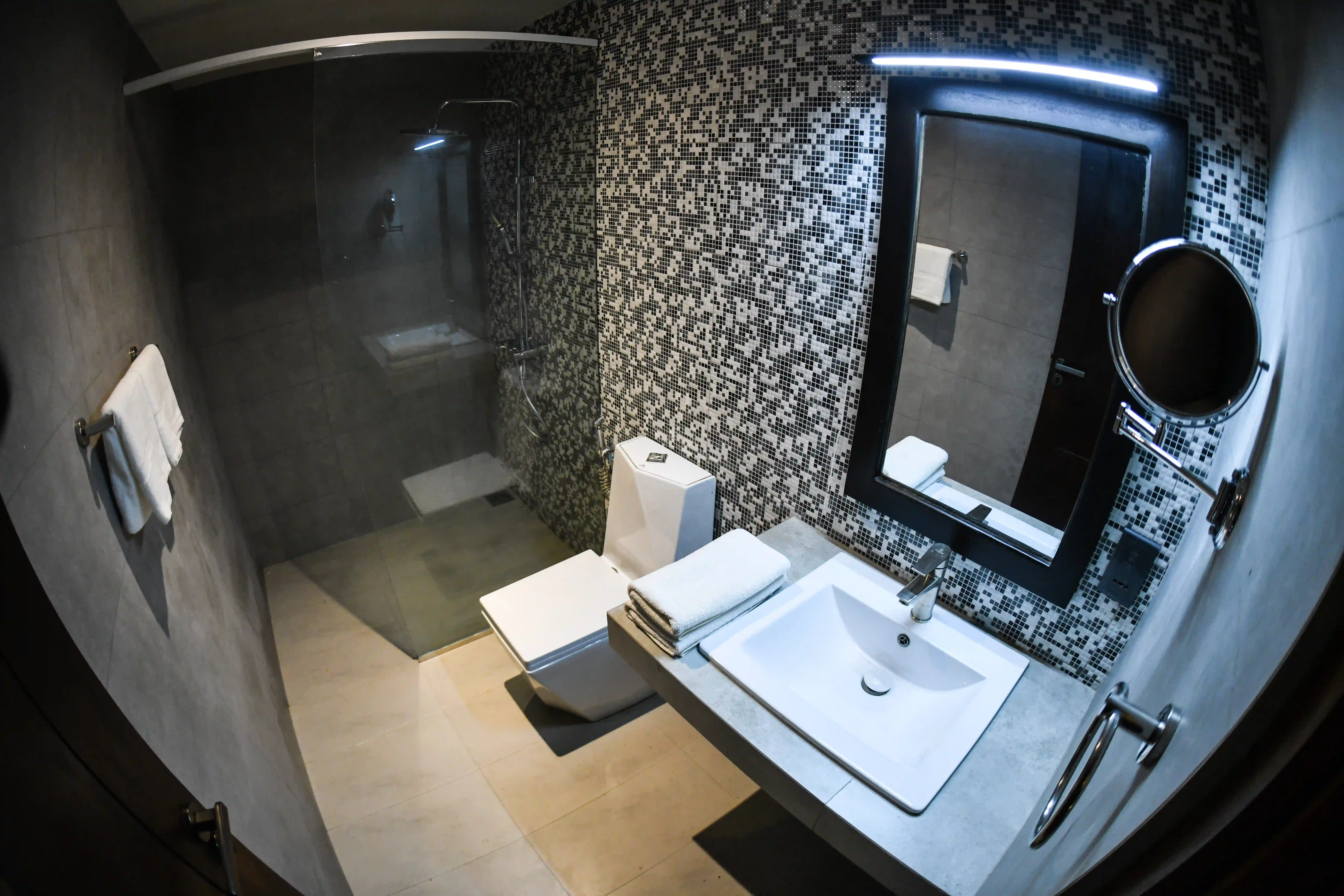Modern bathroom with vanity sink and shower at Hiriketiya Beach Resort for comfortable Hiriketiya accommodation