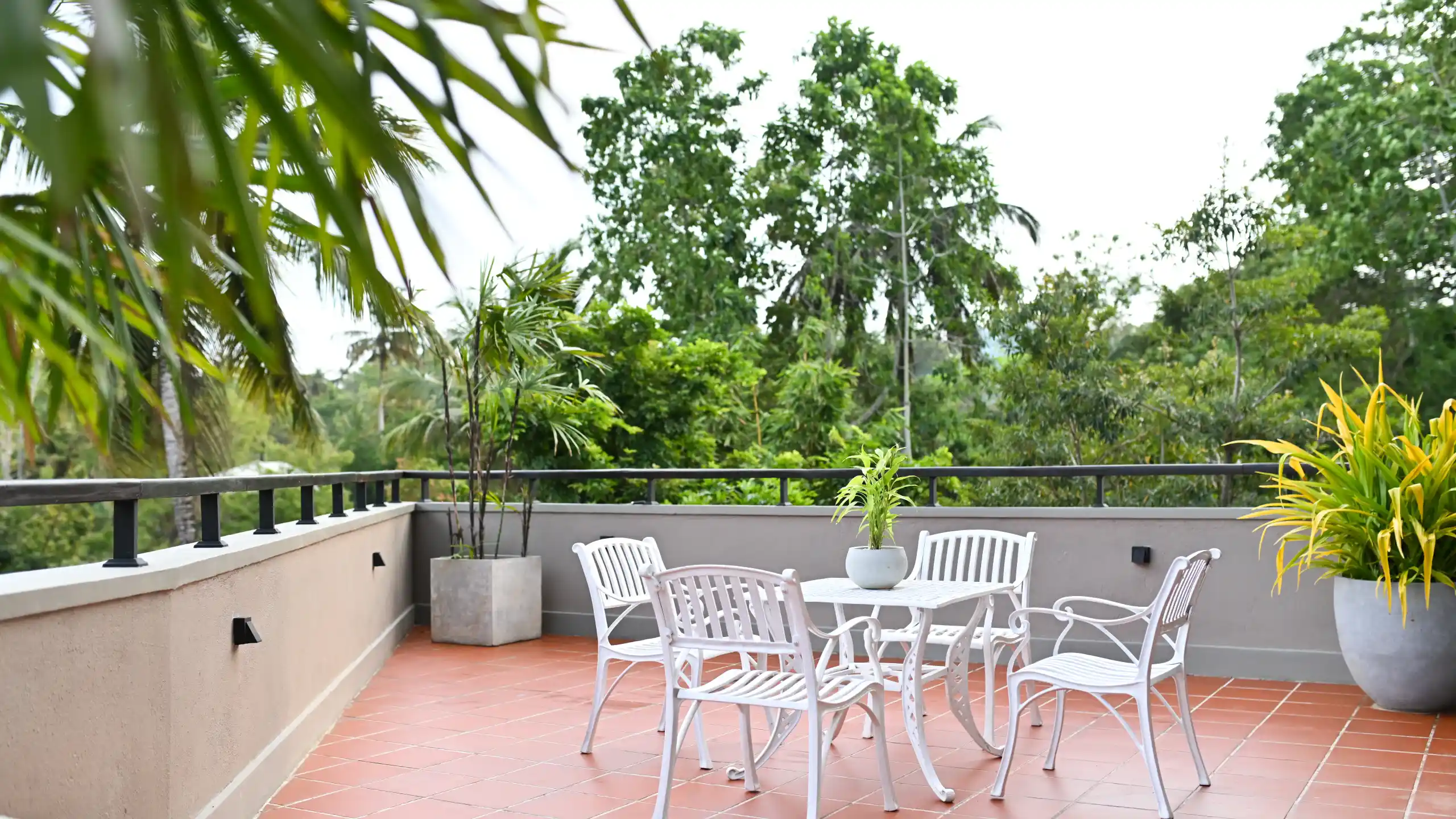 Hiriketiya accommodation garden terrace seating at Hiriketiya Beach Resort