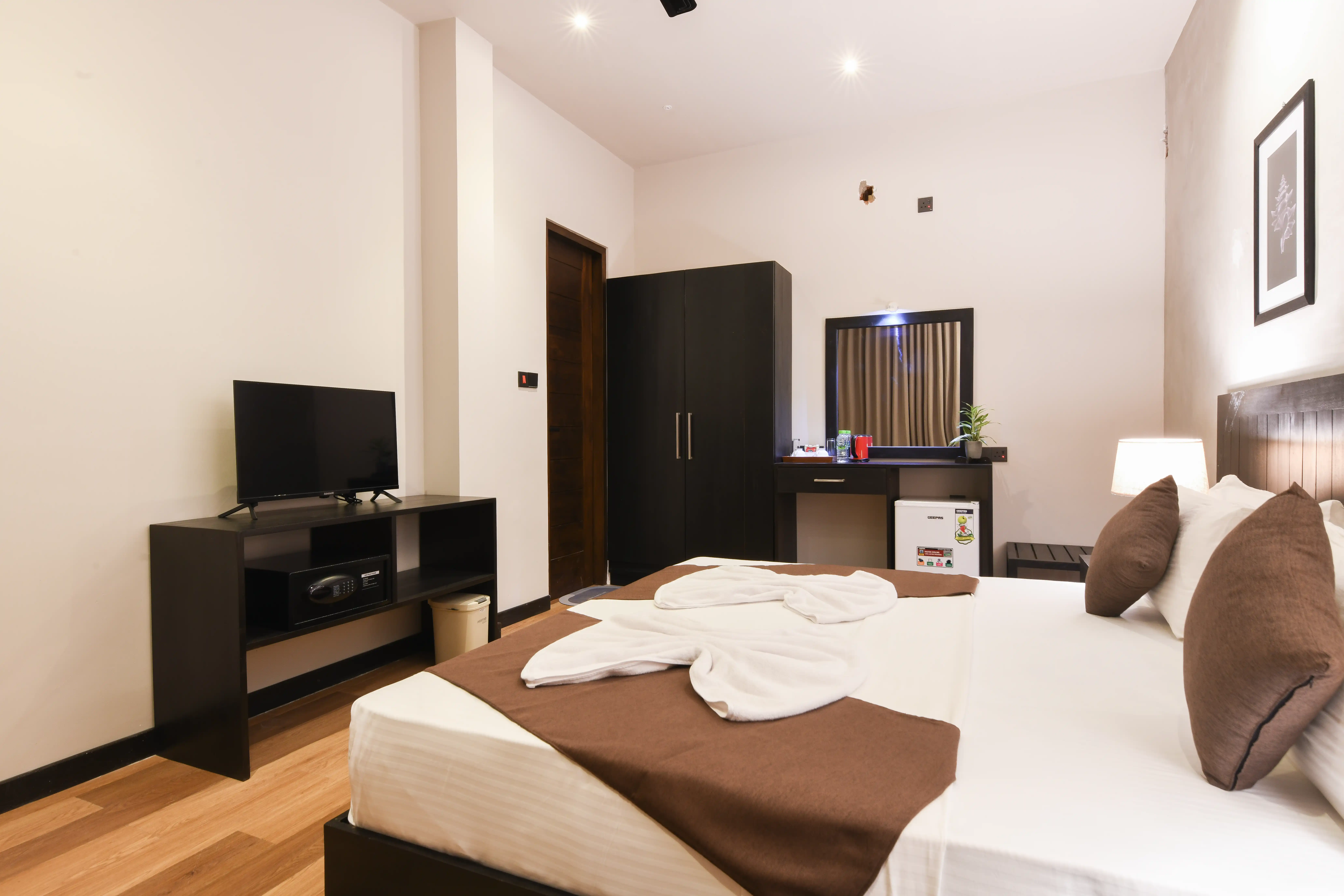 Double room at Hiriketiya Beach Resort with modern amenities in Hiriketiya