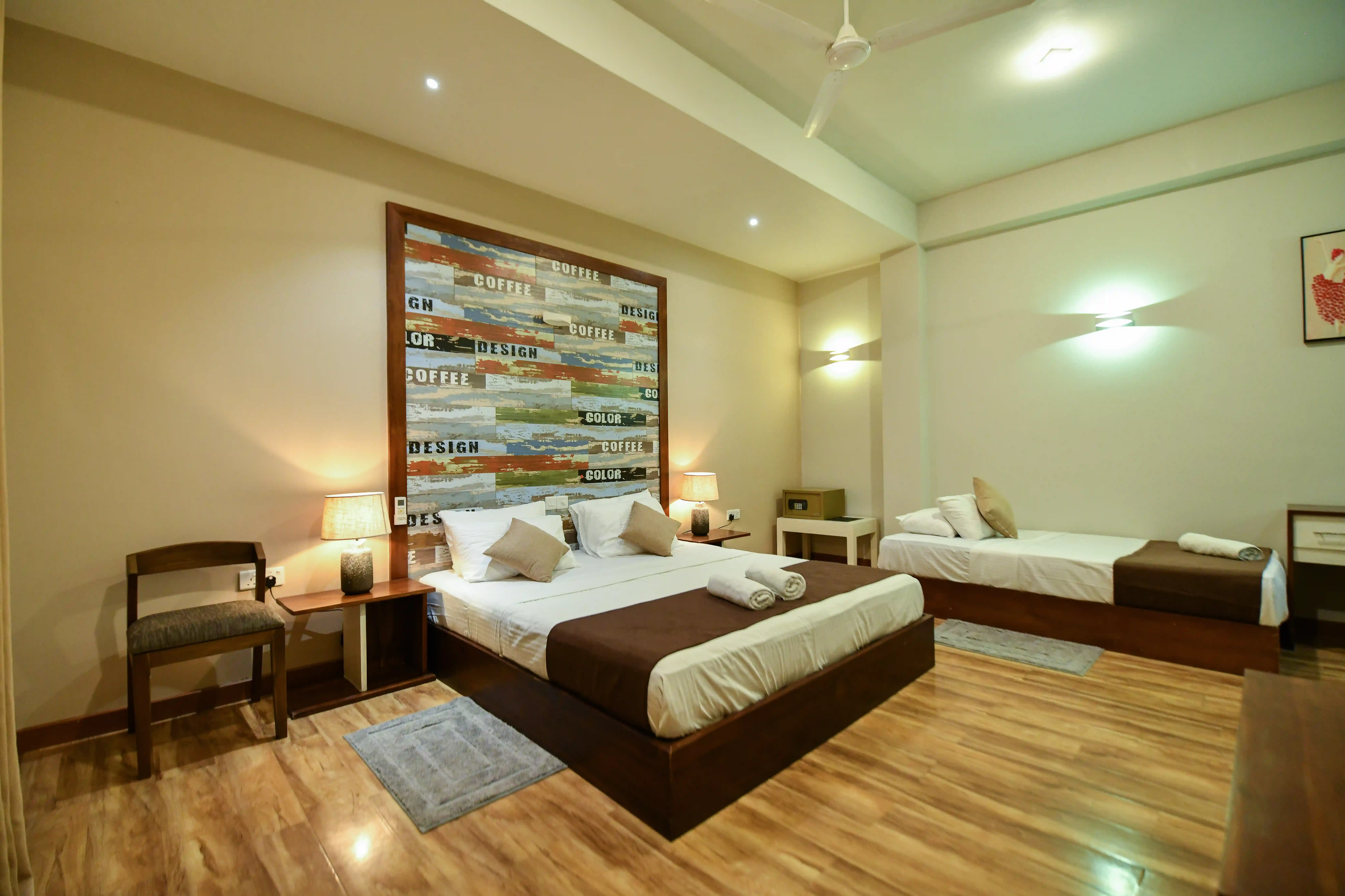 Deluxe Triple room at Hiriketiya Beach Resort with modern amenities in Hiriketiya