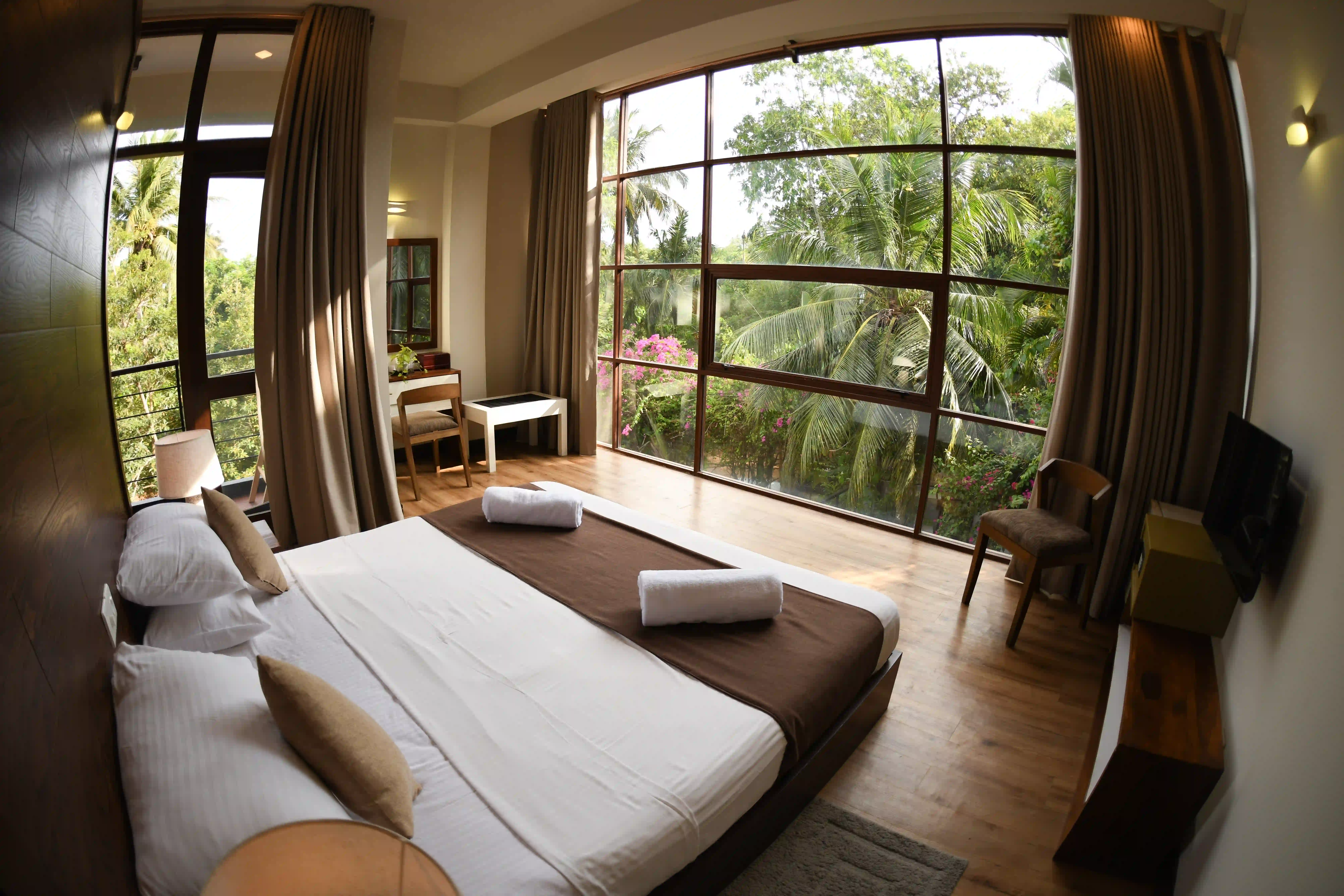 Double room at Hiriketiya Beach Resort with modern amenities in Hiriketiya