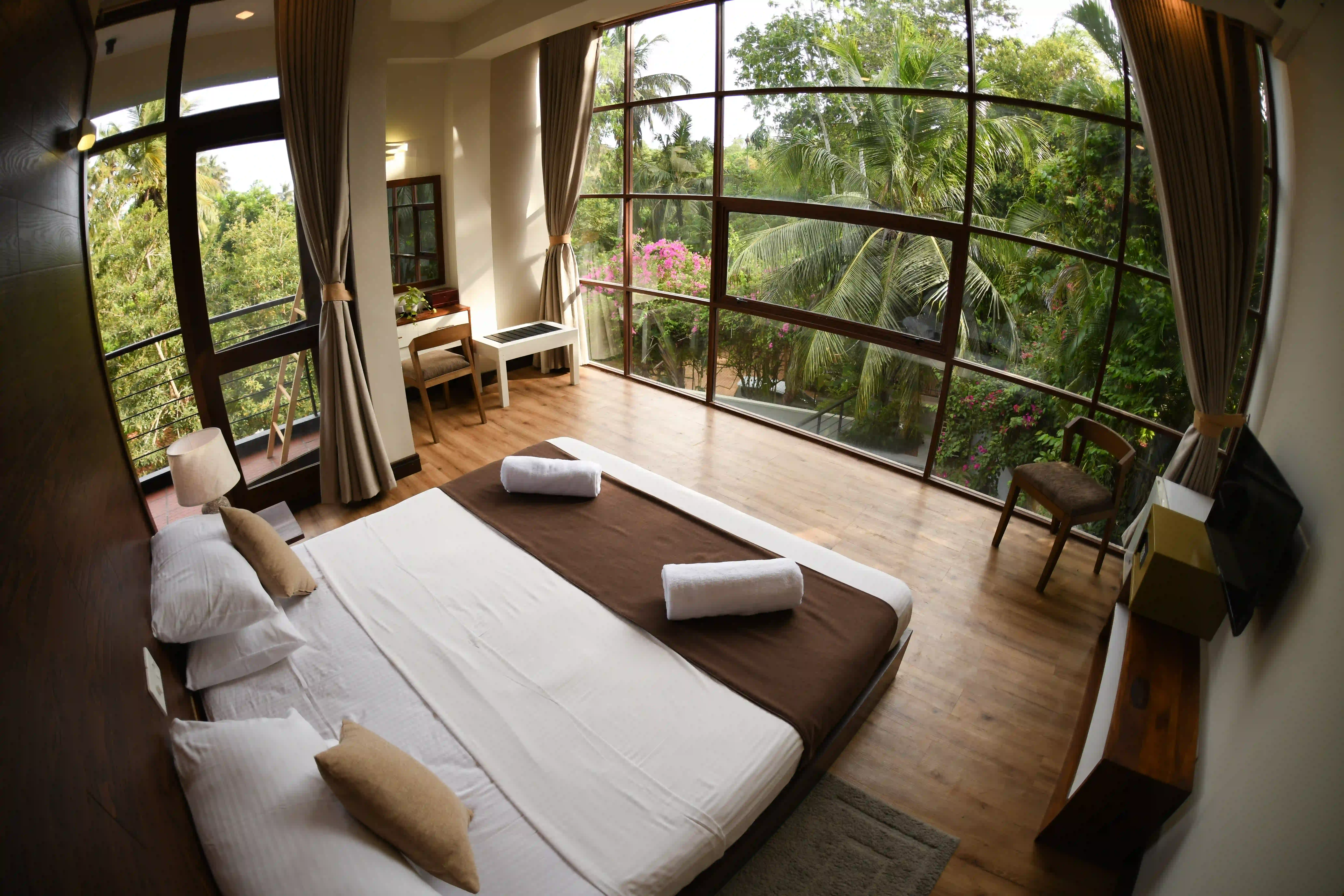 Double room at Hiriketiya Beach Resort with modern amenities in Hiriketiya