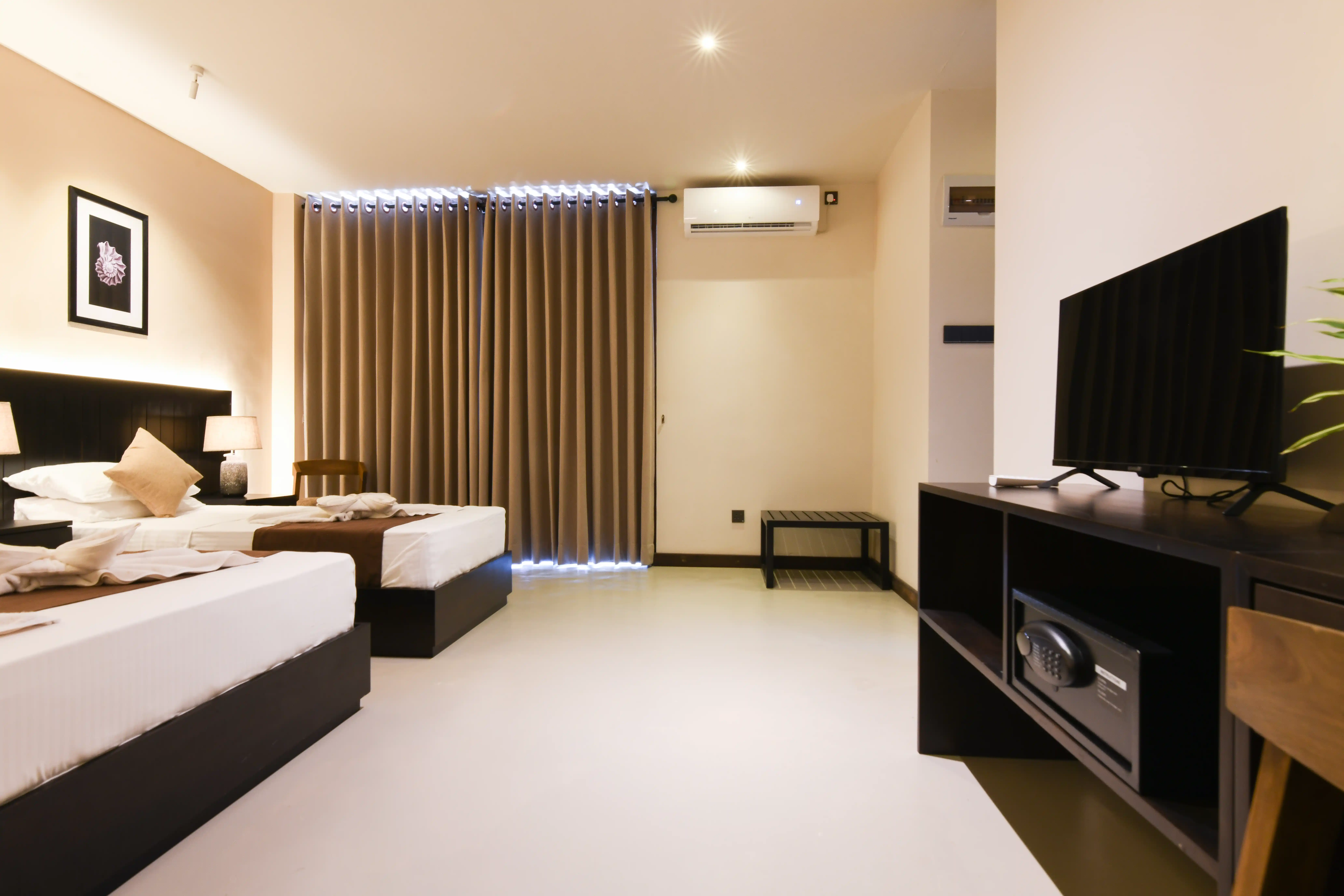 Family Room with Balcony at Hiriketiya Beach Resort with modern amenities in Hiriketiya