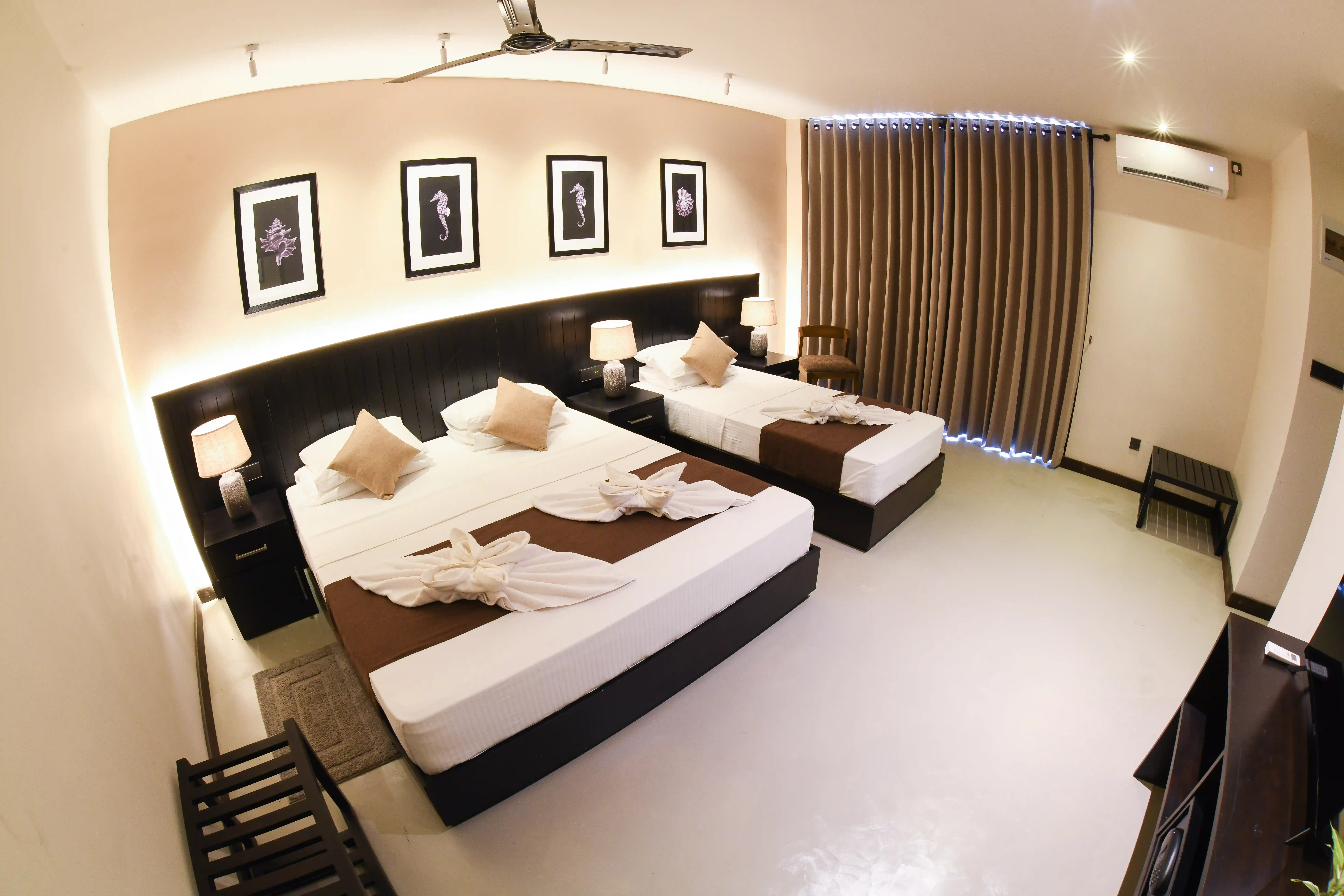 Family Room with Balcony at Hiriketiya Beach Resort with modern amenities in Hiriketiya