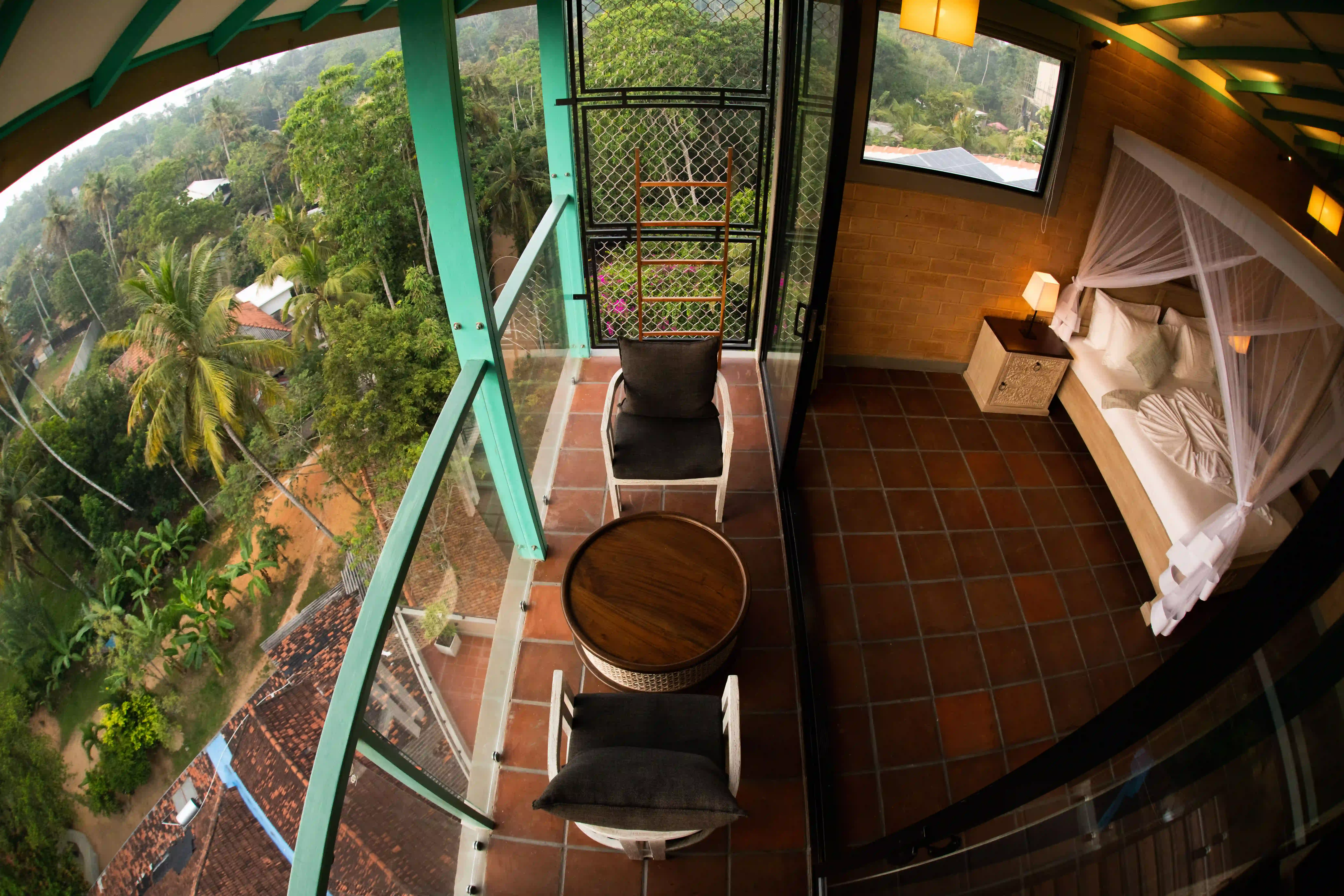 Private balcony seating area with table at Hiriketiya Beach Resort for comfortable Hiriketiya accommodation