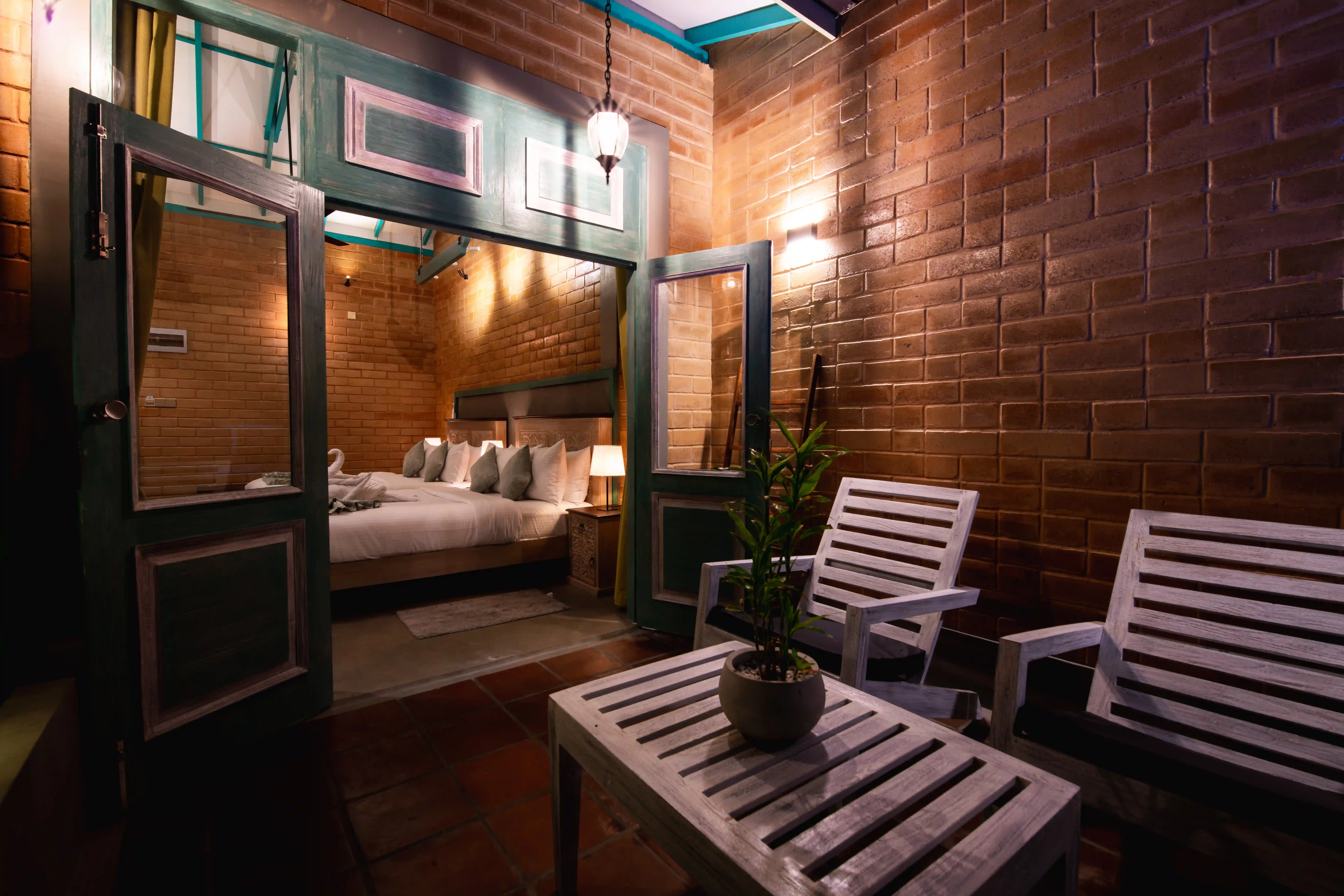 Private balcony at Hiriketiya accommodation with outdoor seating at Hiriketiya Beach Resort