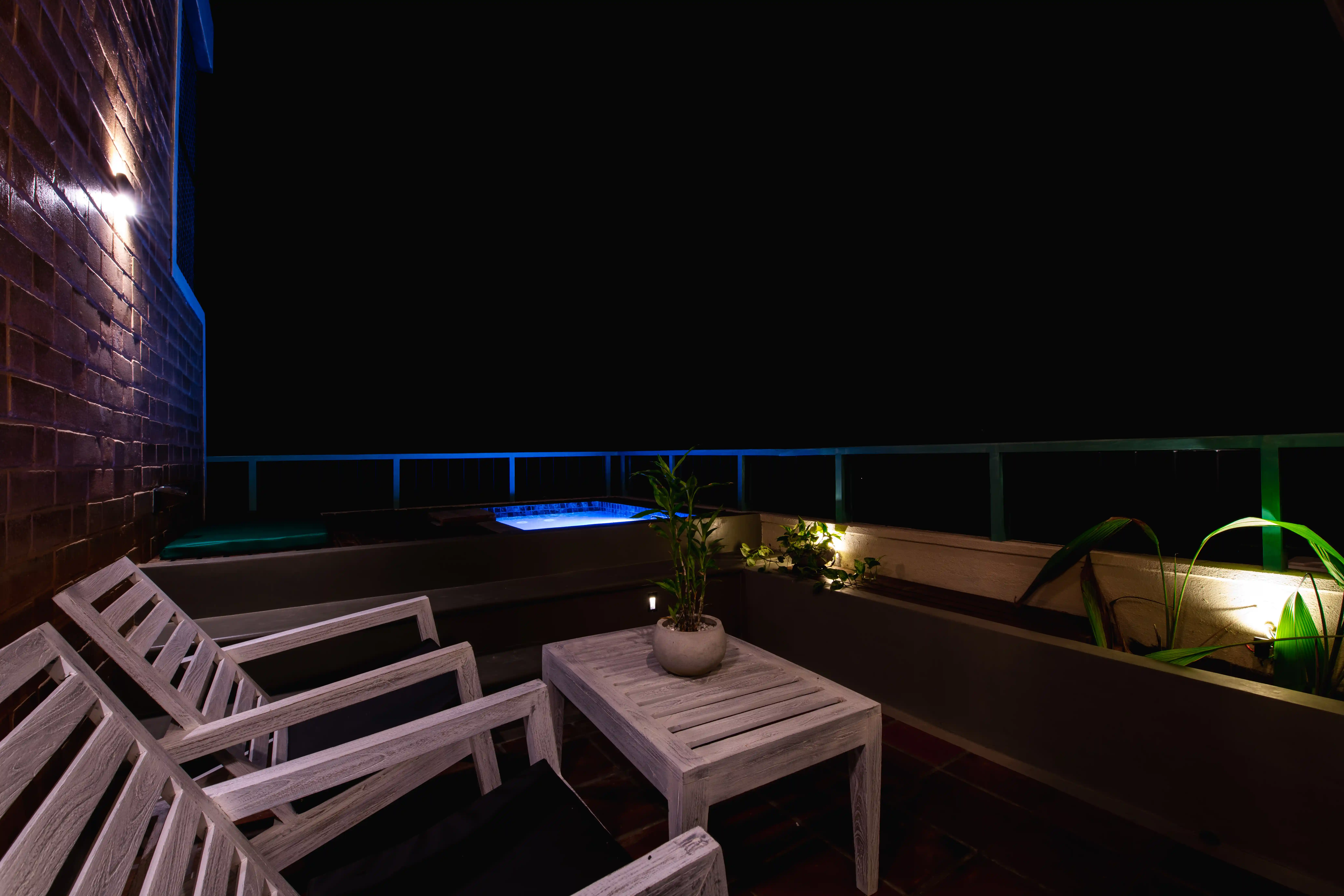 Private balcony at Hiriketiya accommodation with outdoor seating at Hiriketiya Beach Resort