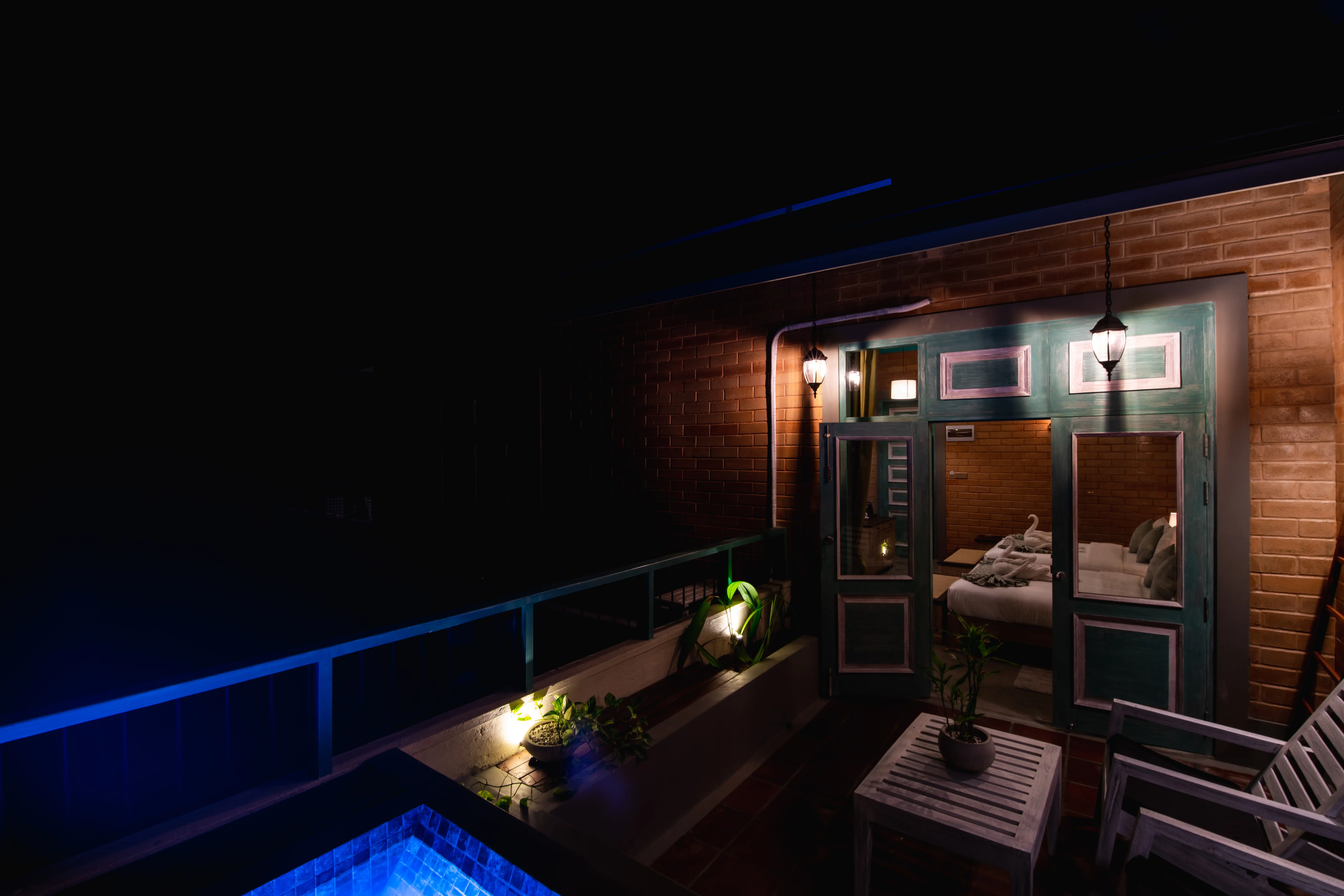 Private balcony at Hiriketiya accommodation with outdoor seating at Hiriketiya Beach Resort