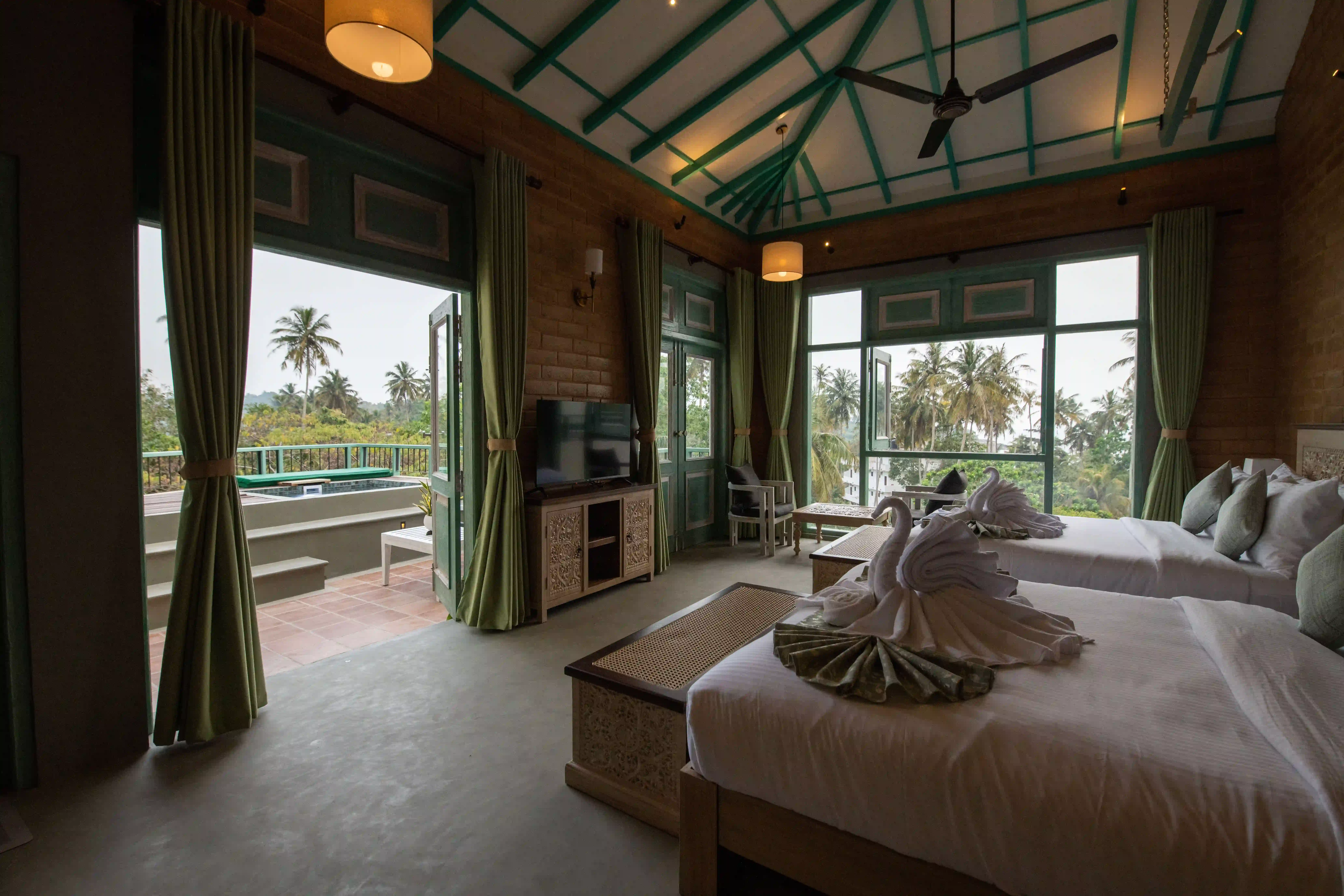 Family Room with Balcony at Hiriketiya Beach Resort with modern amenities in Hiriketiya