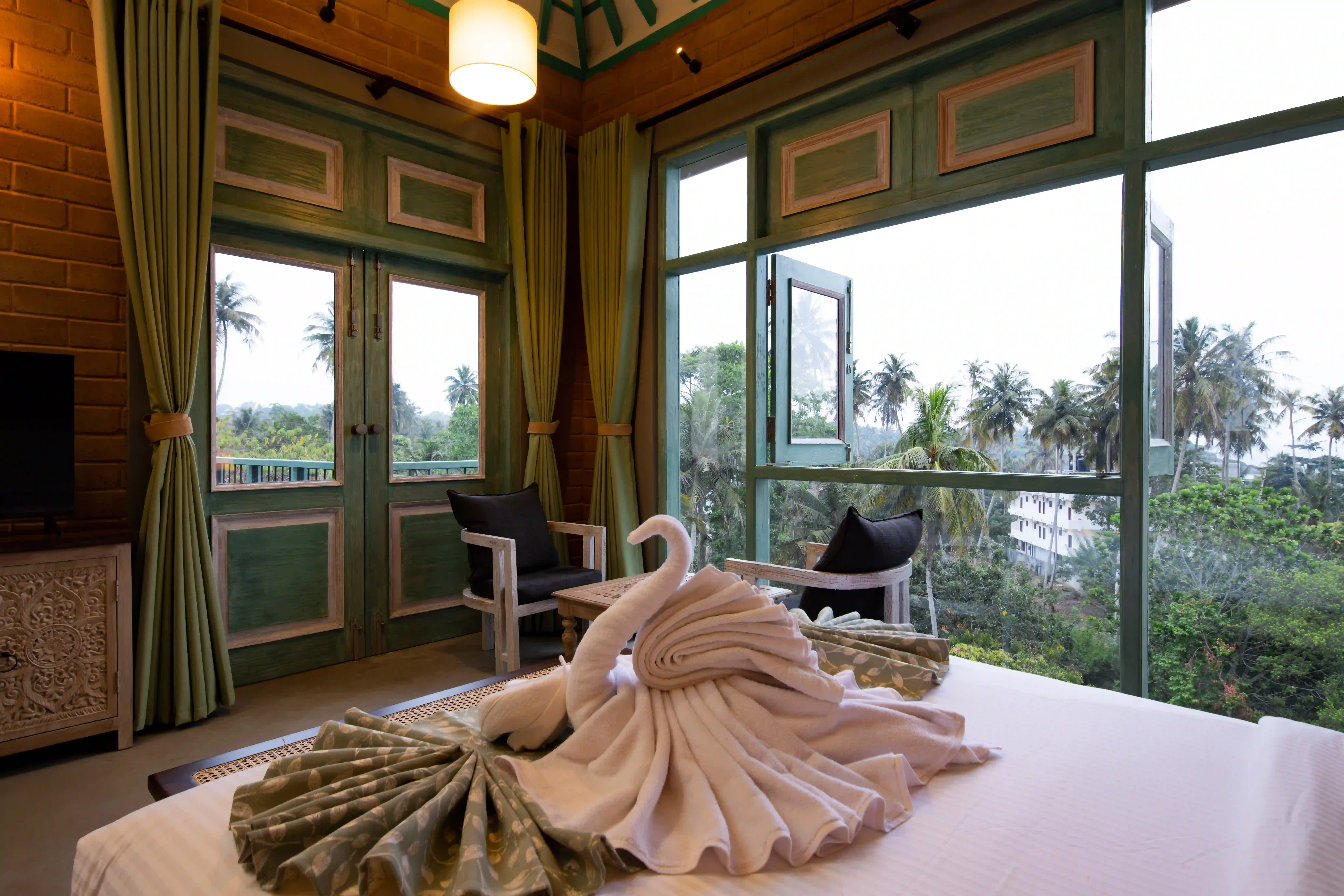 Family Room with Balcony at Hiriketiya Beach Resort with modern amenities in Hiriketiya