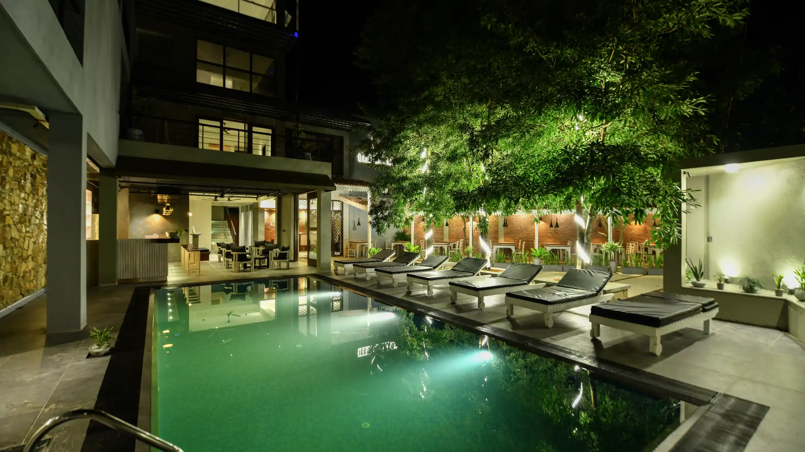 Best beach resorts in Sri Lanka night pool view at Hiriketiya Beach Resort