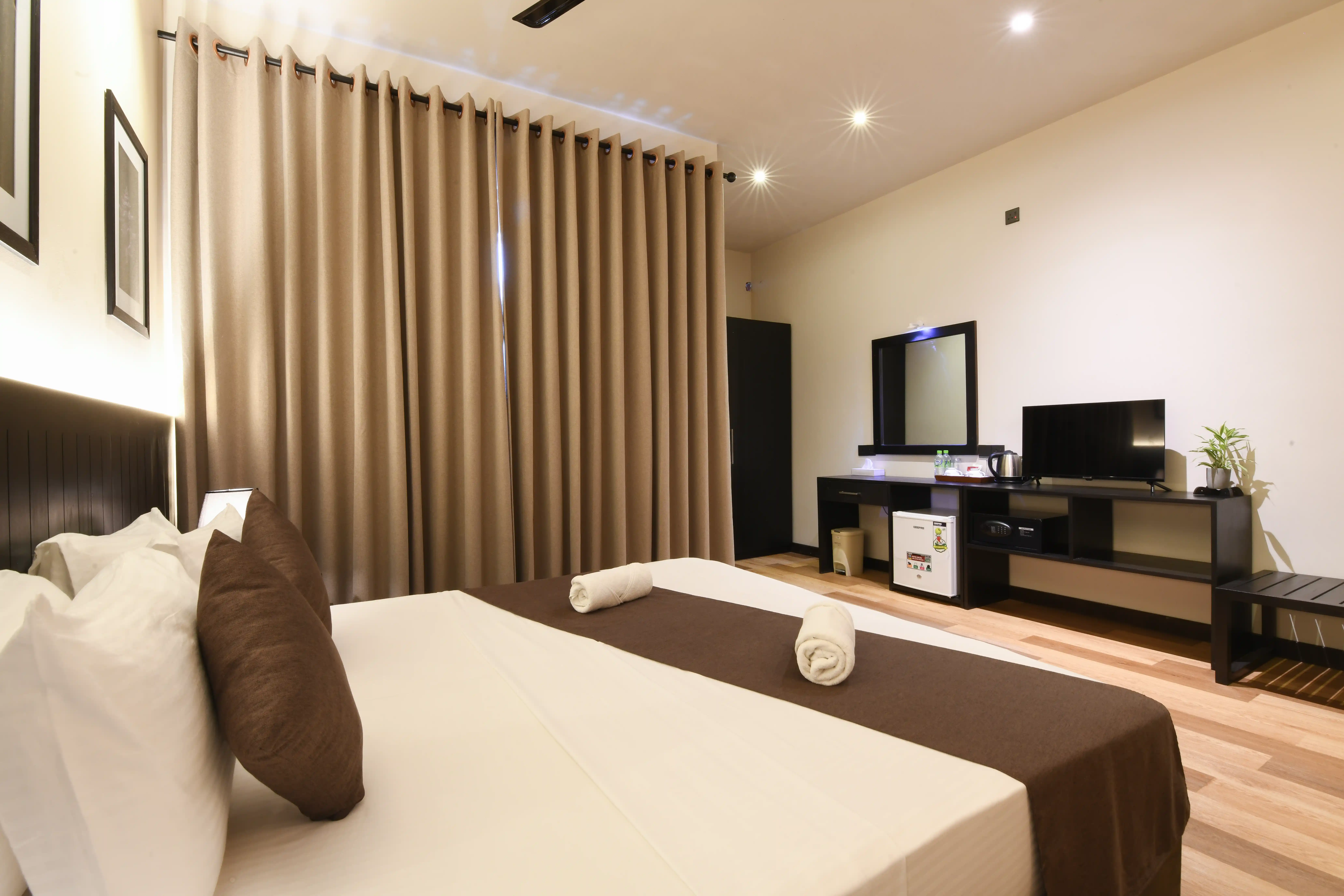 Double room at Hiriketiya Beach Resort with modern amenities in Hiriketiya