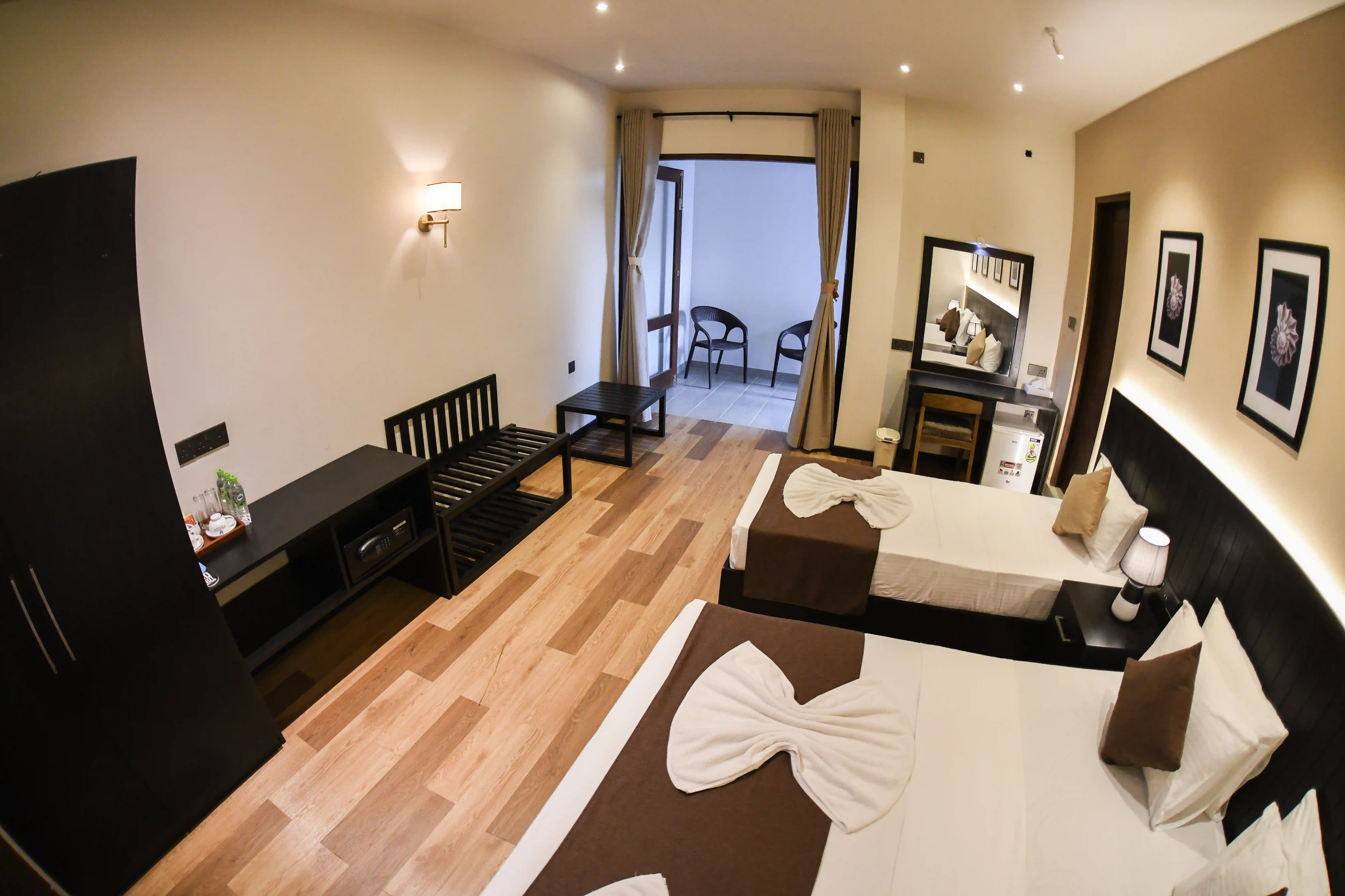 Superior Triple Room at Hiriketiya Beach Resort with modern amenities in Hiriketiya