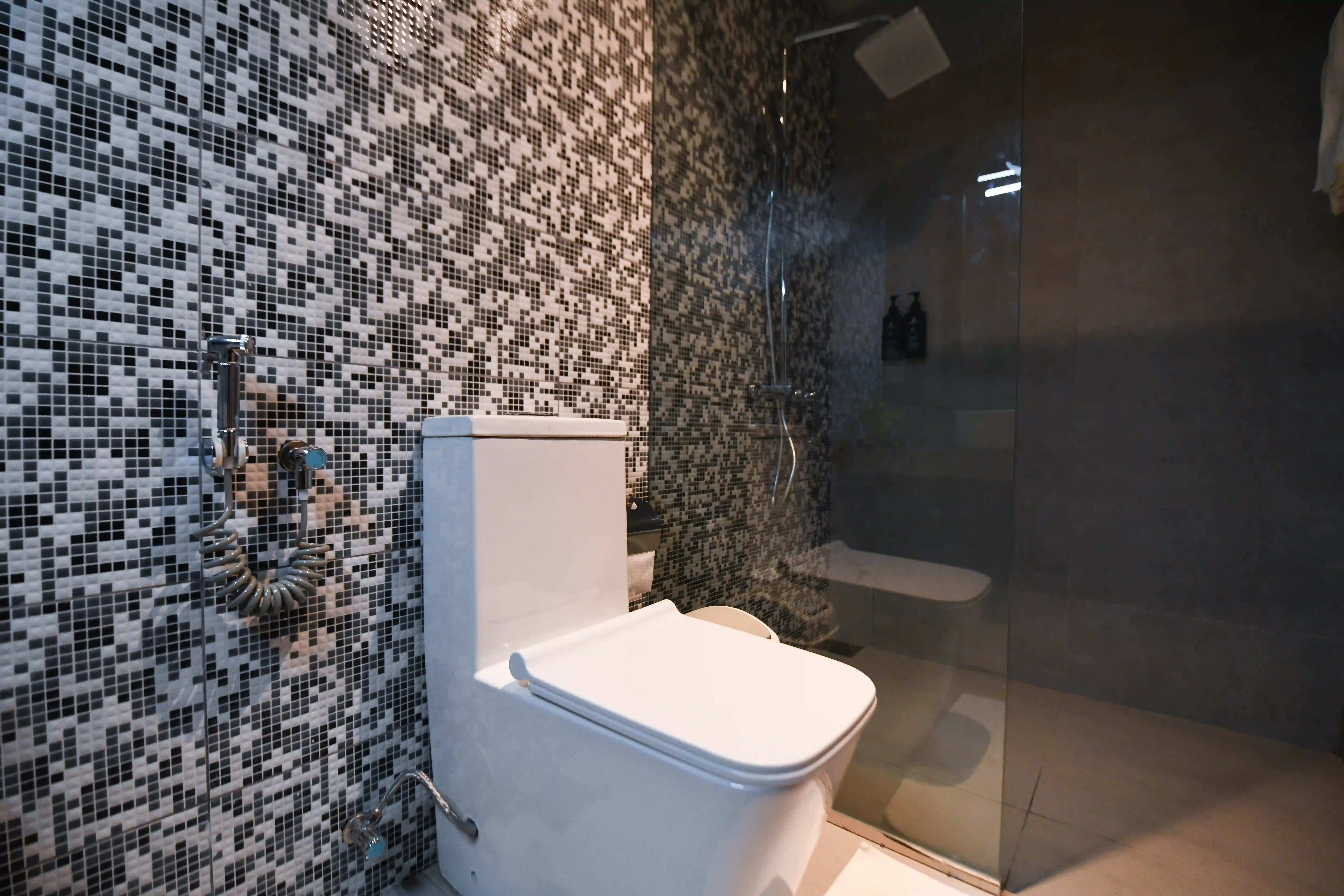 Modern bathroom with toilet and shower at Hiriketiya Beach Resort for comfortable Hiriketiya accommodation